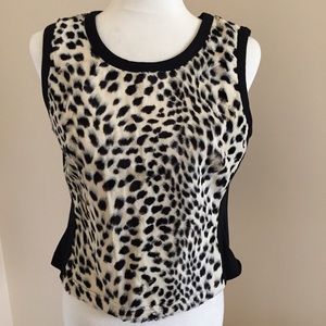 Sleeveless leopard print top, lightly worn.